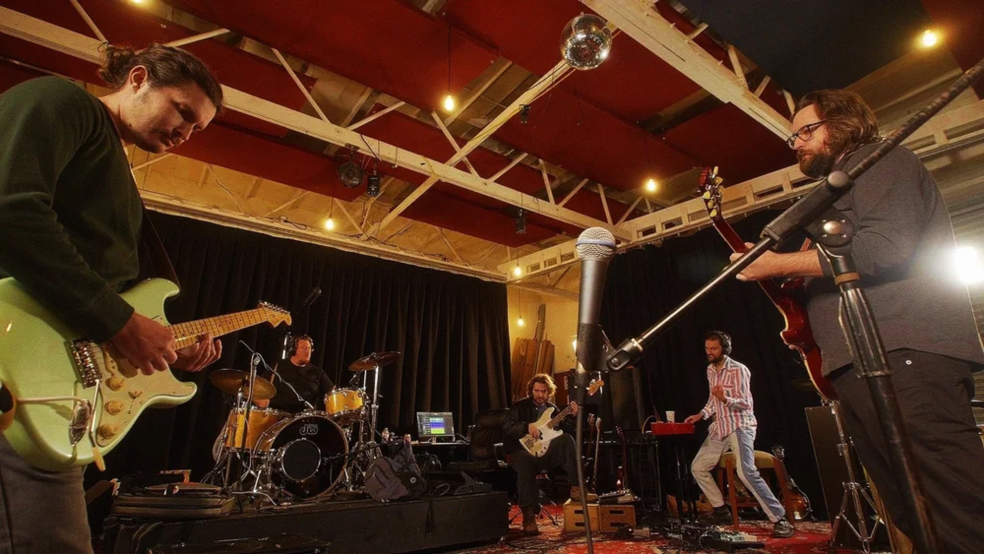 The Taverna Project performing together in the studio