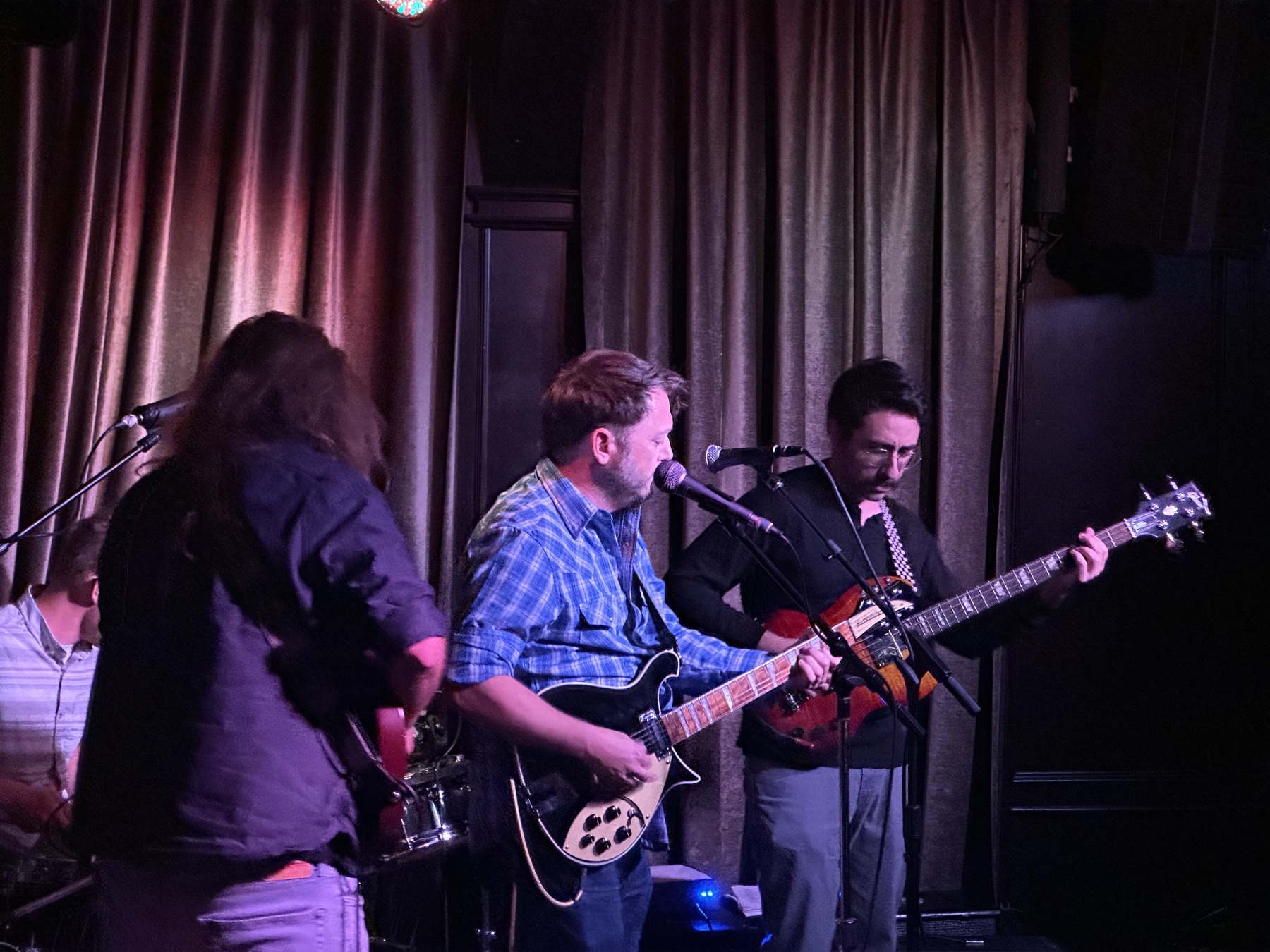 David Sparrow performing with a band at the Hotel Cafe