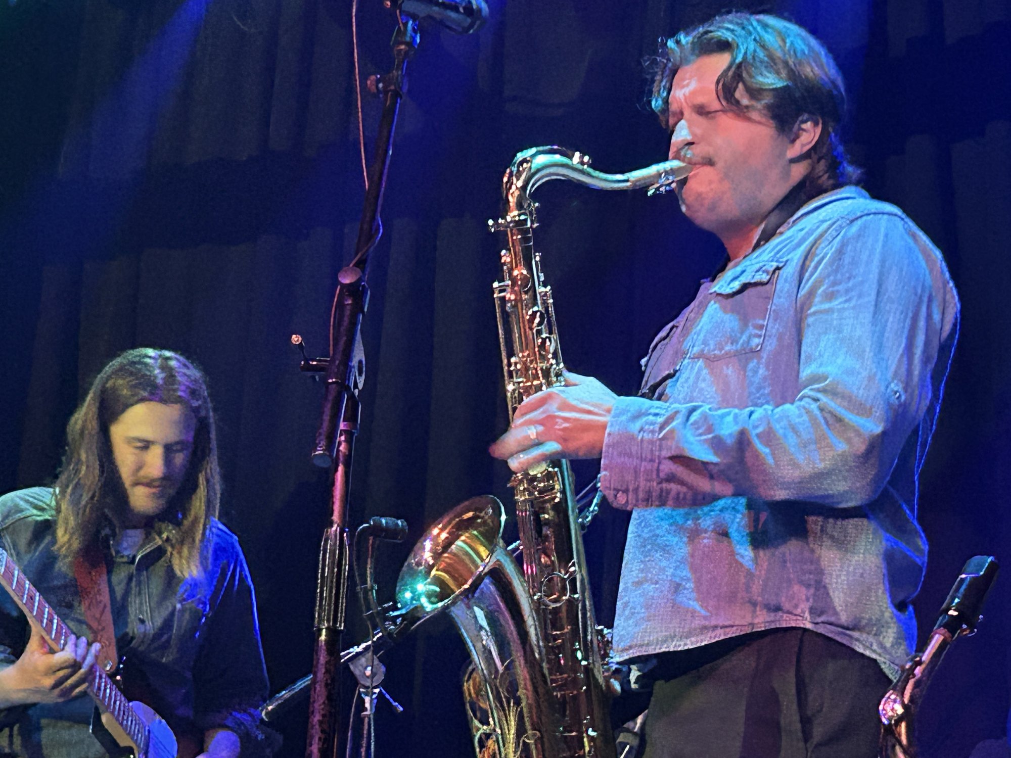 Matterform saxophonist and guitarist performing together at SOHO